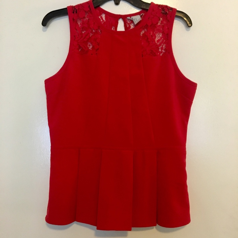 Red peplum top with lace accents!